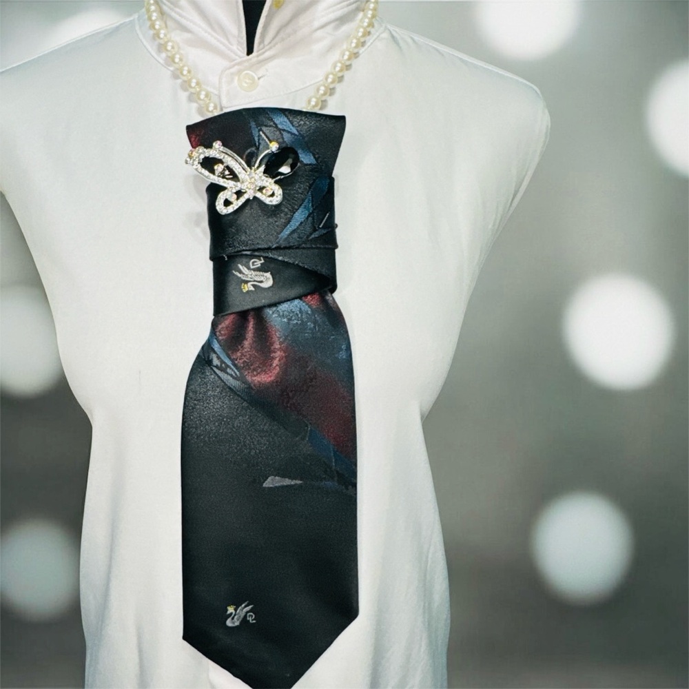 Elegant Black, Blue, and Burgundy Patterned Necktie with Butterfly Brooch
